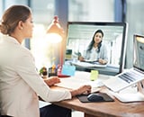 Two women on remote meeting conference call.