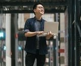 Man in warehouse with tablet