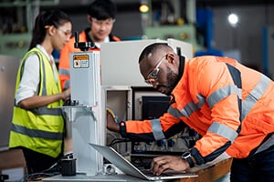 Engineers working in a machine workshop