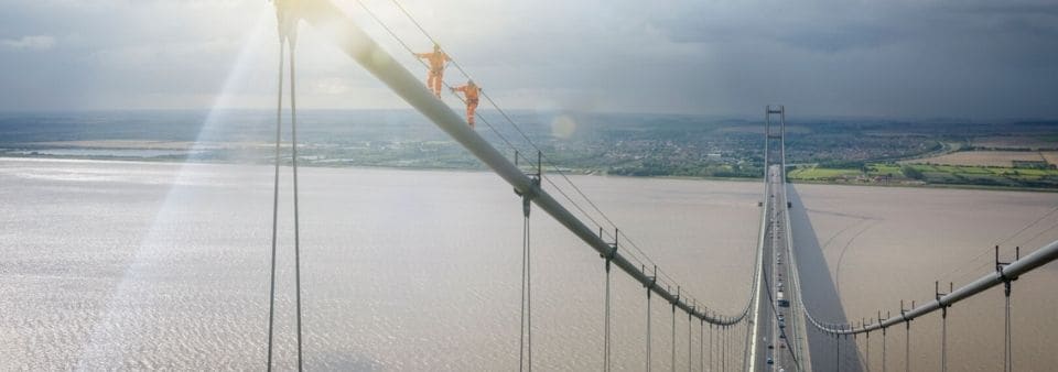 Construction workers on bridge