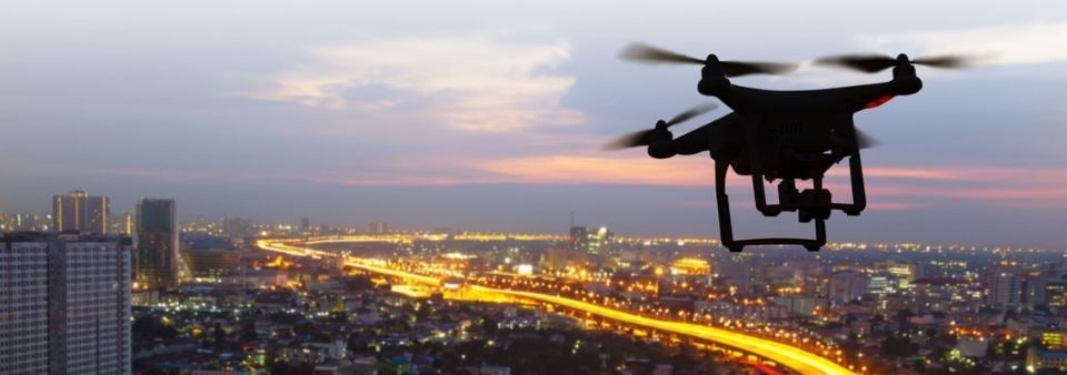 Drone flying over city