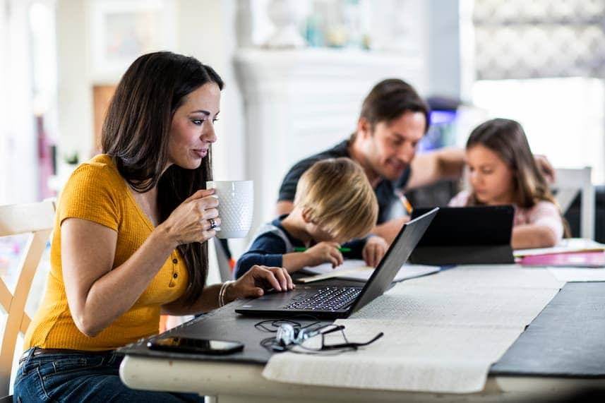 Mother working from home while children attend school online (1).jpg