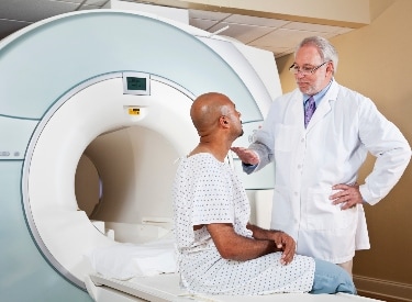 Doctor consult a patient before MRI scan