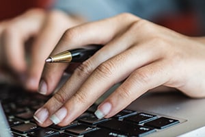 Woman using laptop