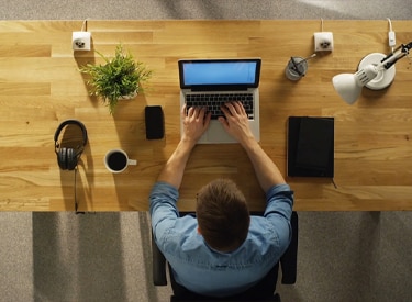 Woman taking note computer