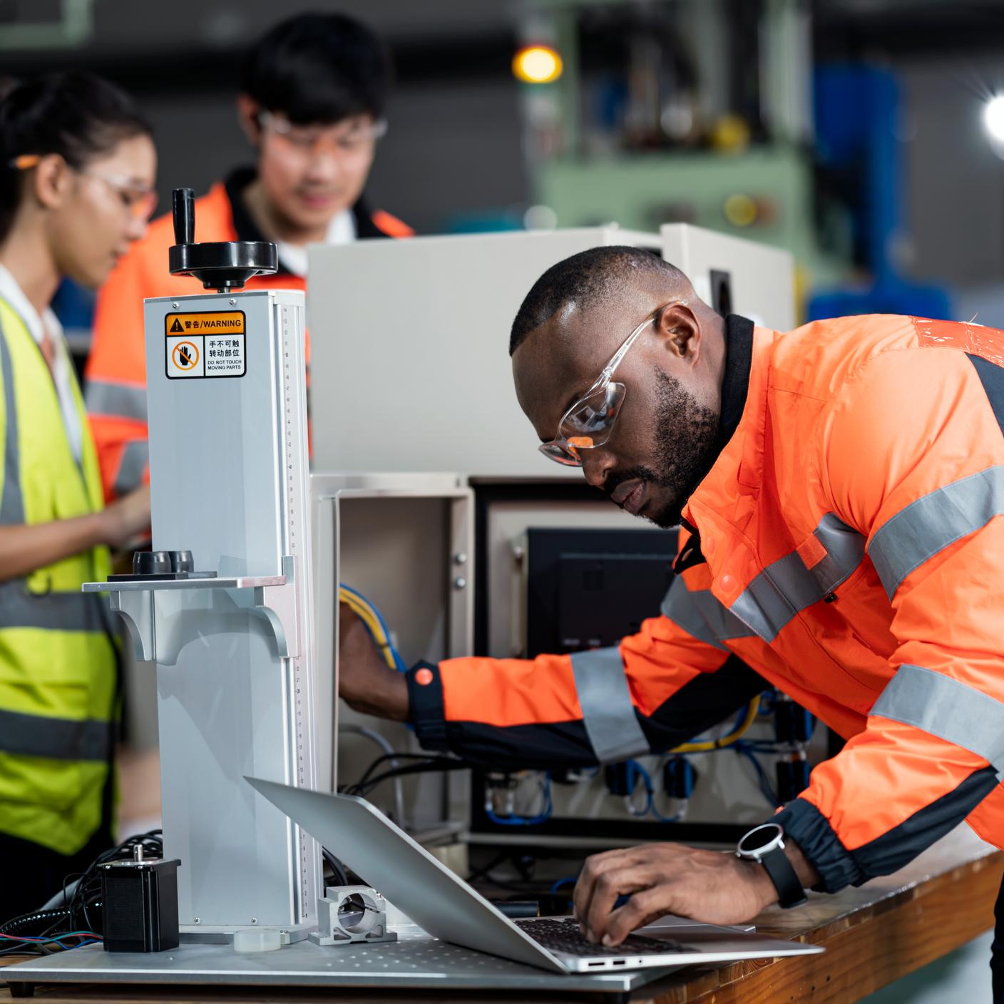  Electrical engineers in renewable energy factory