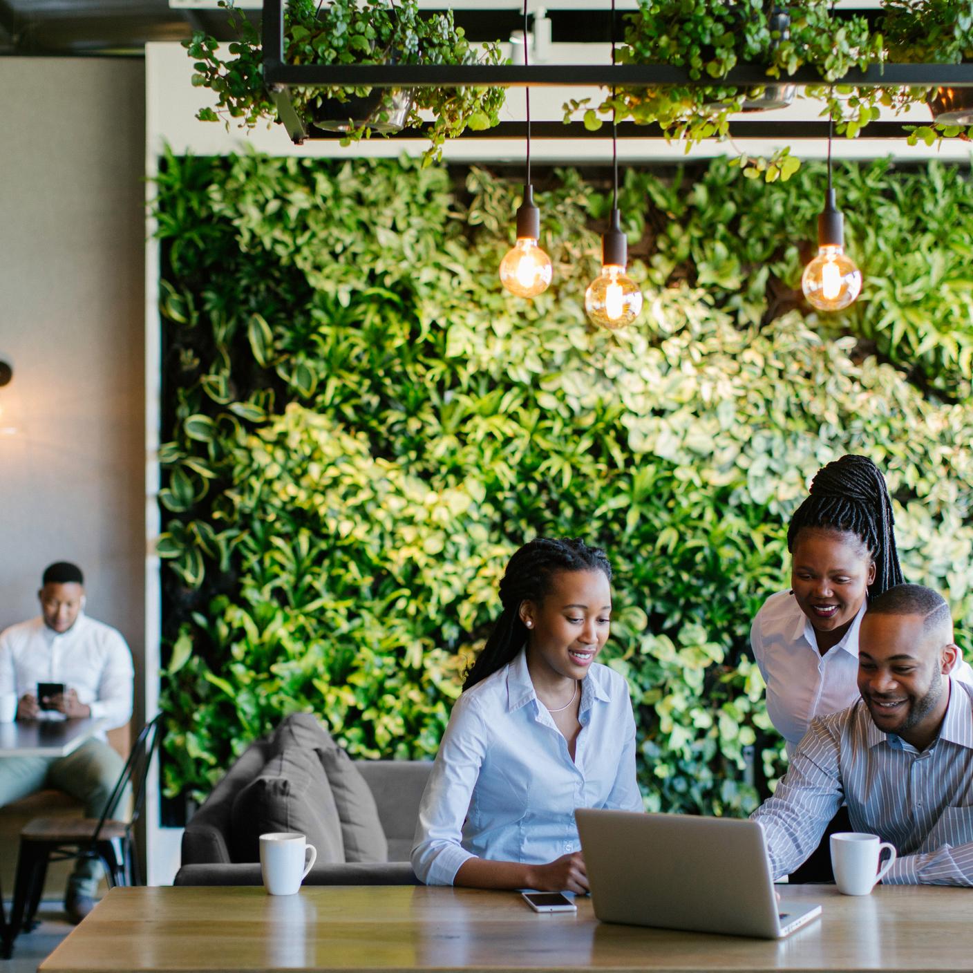 Young African business people having a meeting in a beautiful office.