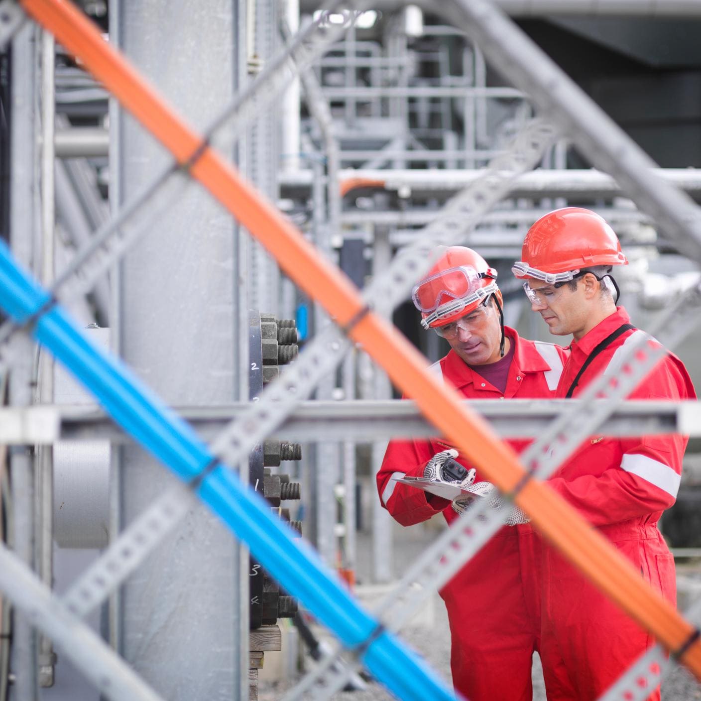 Hard hard workers auditing gas works