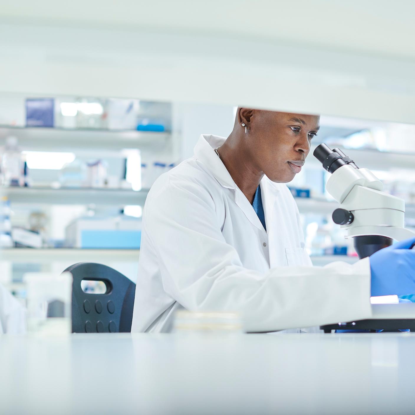 female scientist in a busy research