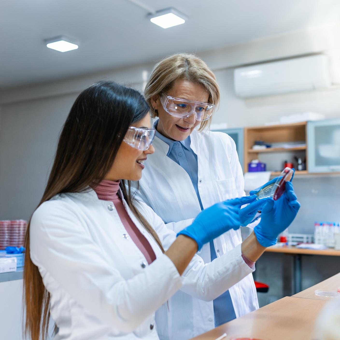 Two women working on a lab