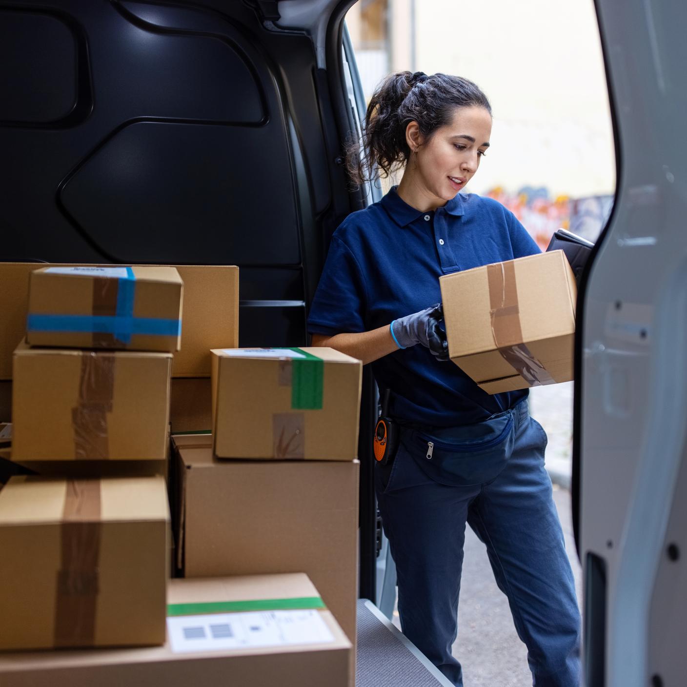 Delivery women carrying boxes