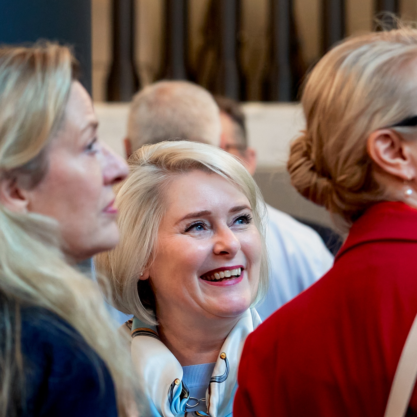 Woman laughing and discussing