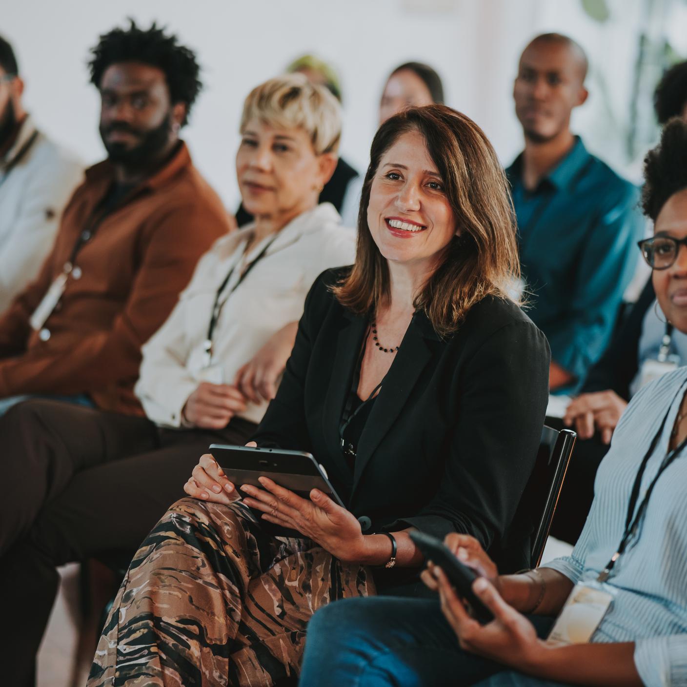 A woman assisting to a meeting