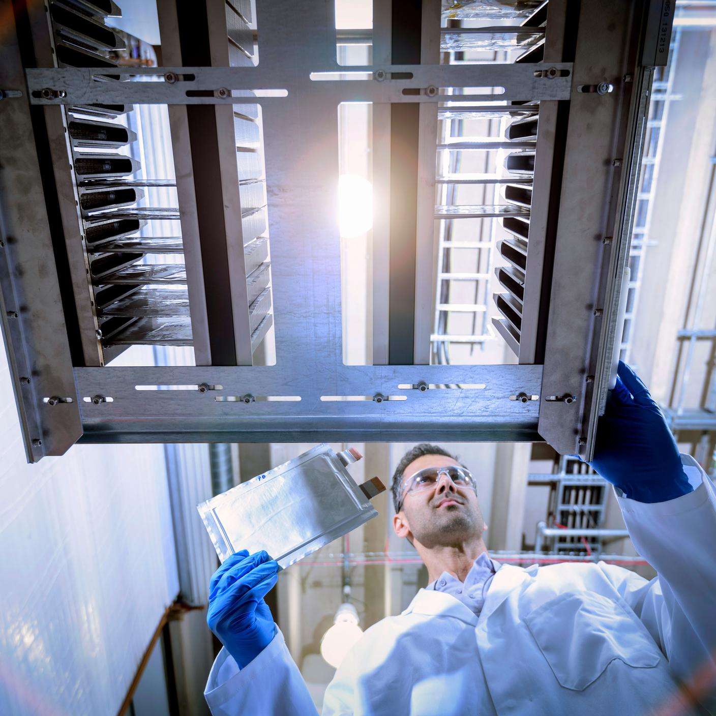 Man working on lithium-ion batteries