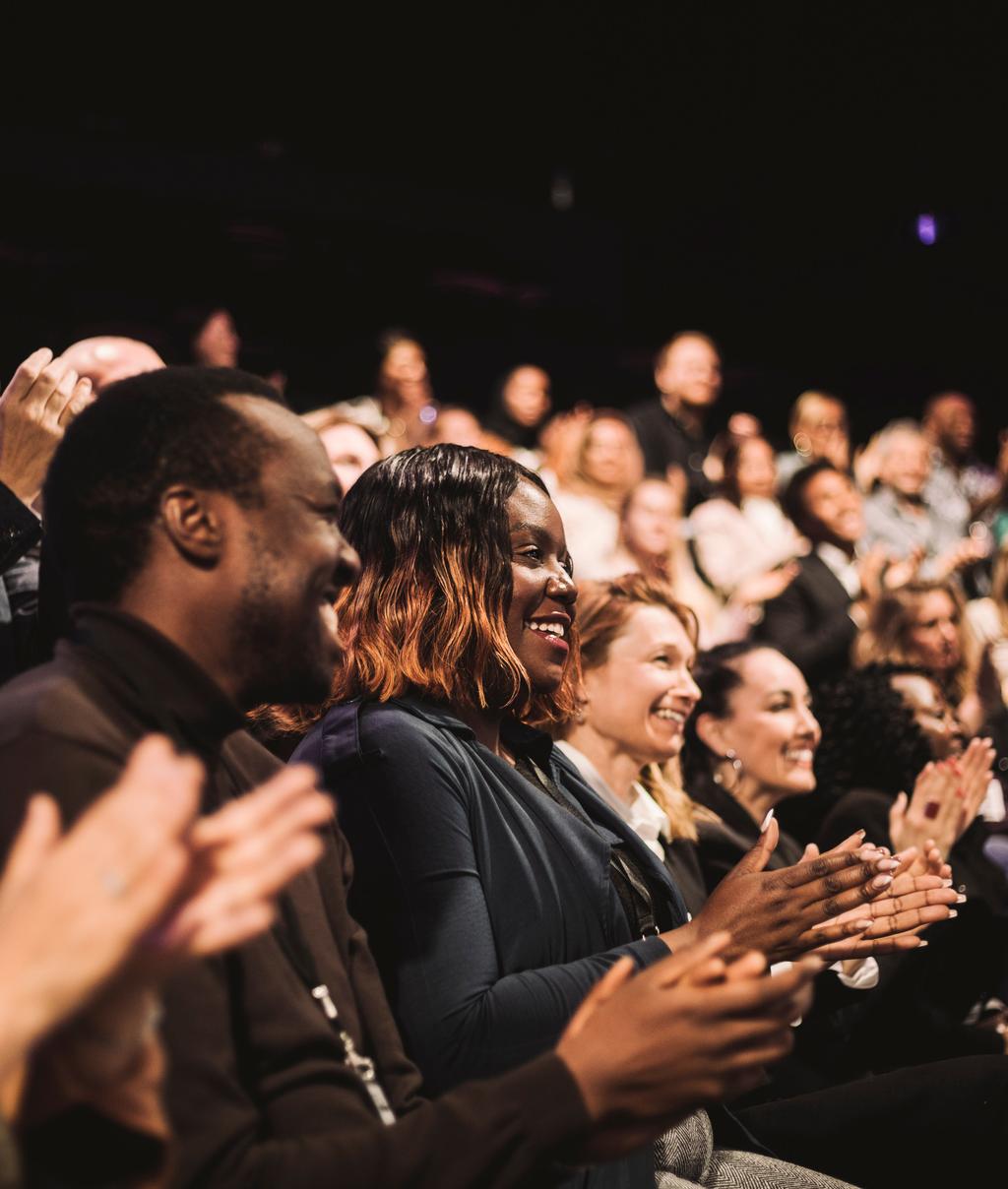 Consumer standards - people applauding in audience