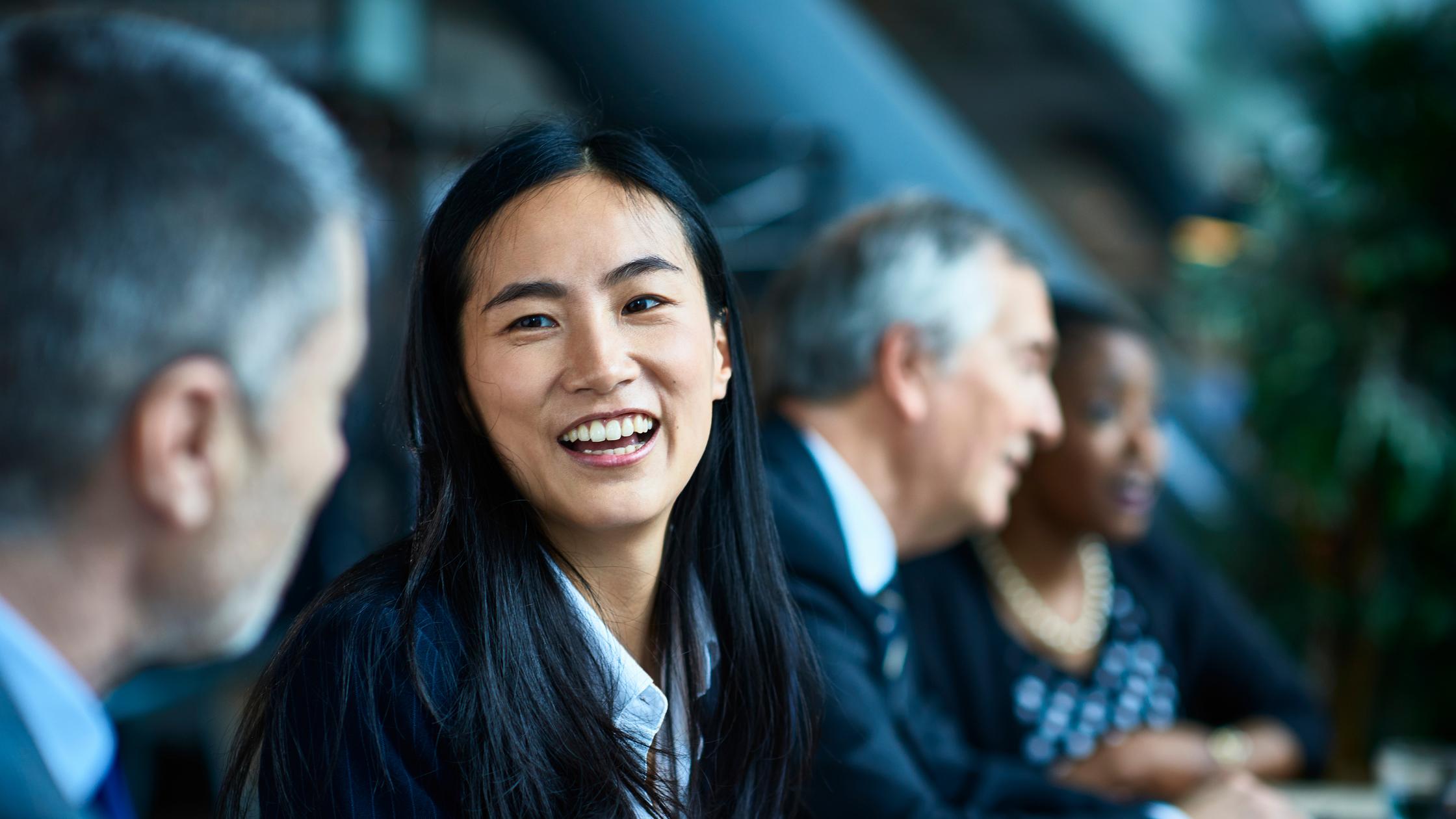 Expert smiling in workgroup