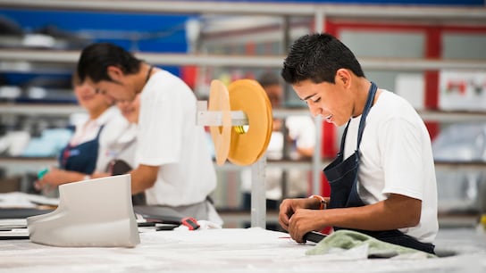 people working on machinery