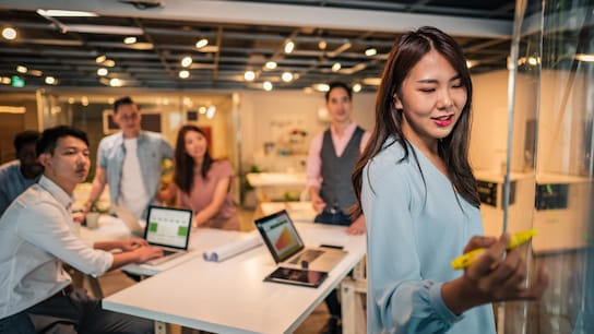 Group of people working in modern office