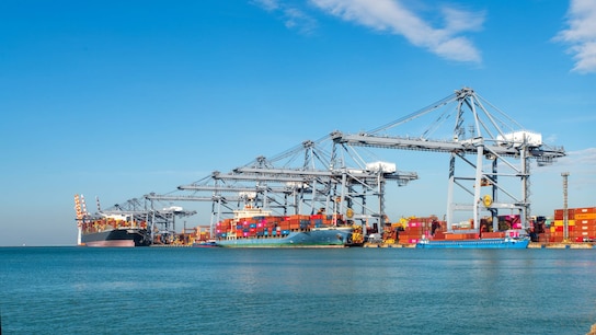 Container ship loading and unloading in sea port