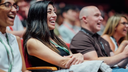 A man and a woman laughing